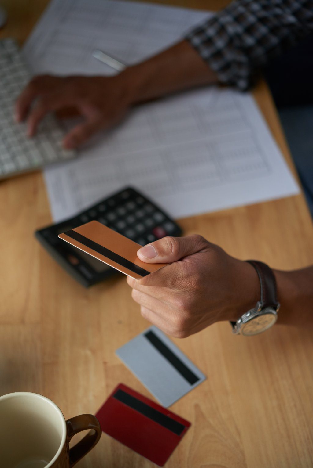 Banking and credit cards 15 Top View Cropped Male Hands Paying With Plastic Card Online Purchase